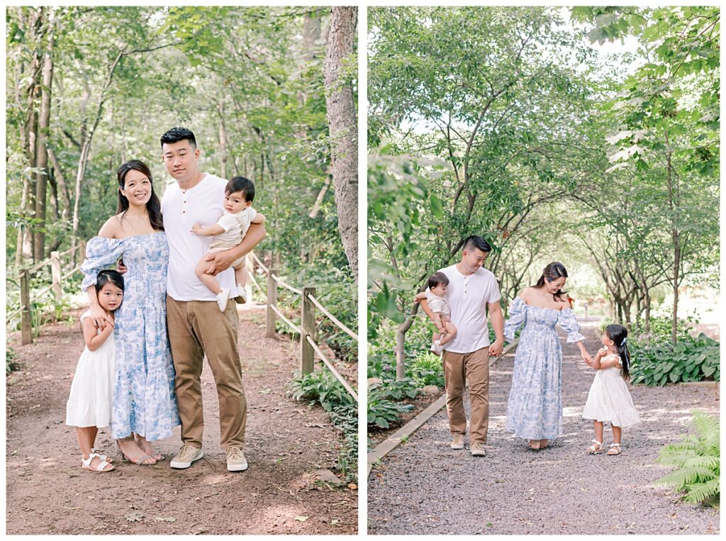 A family of 4 walking down a tree lined path