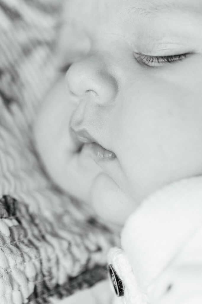 a close up of a newborn's mouth
