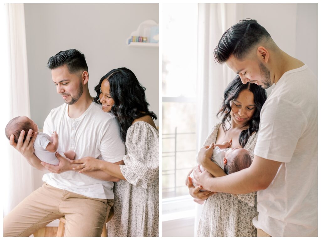 A couple holds their newborn in the nursery during their lifestyle in-home newborn session.