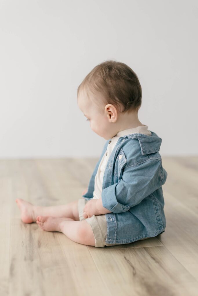 Choosing Privacy in the Age of AI Baby in denim jacket shown from the side, a quiet in-between moment
